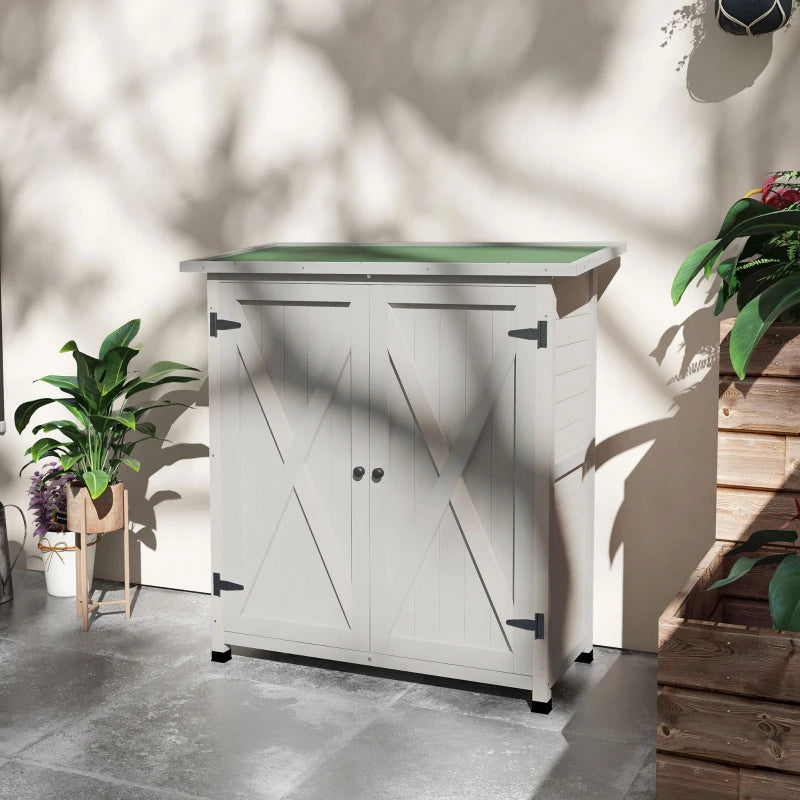 Image of a white wooden garden storage cabinet  with a green felt roof