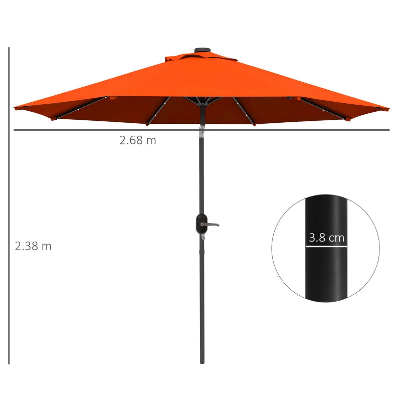 Image of an orange parasol with lights