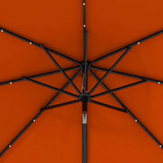 Image of an orange parasol with lights