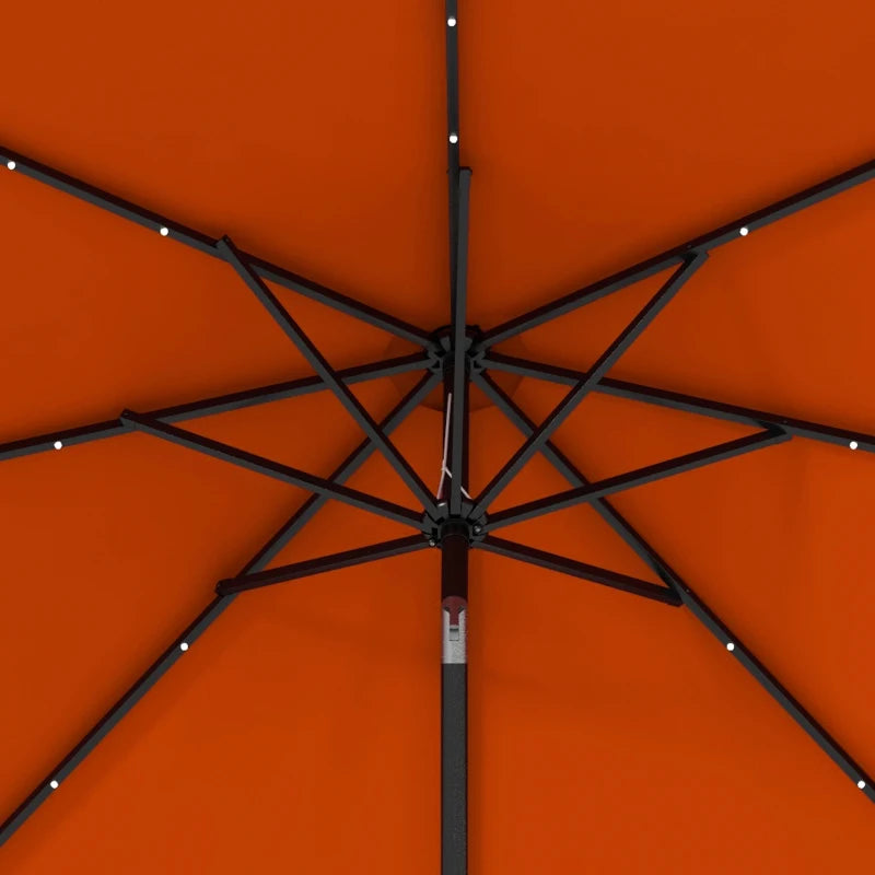 Image of an orange parasol with lights