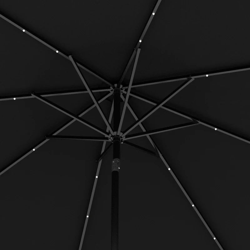 Image of a black parasol with lights