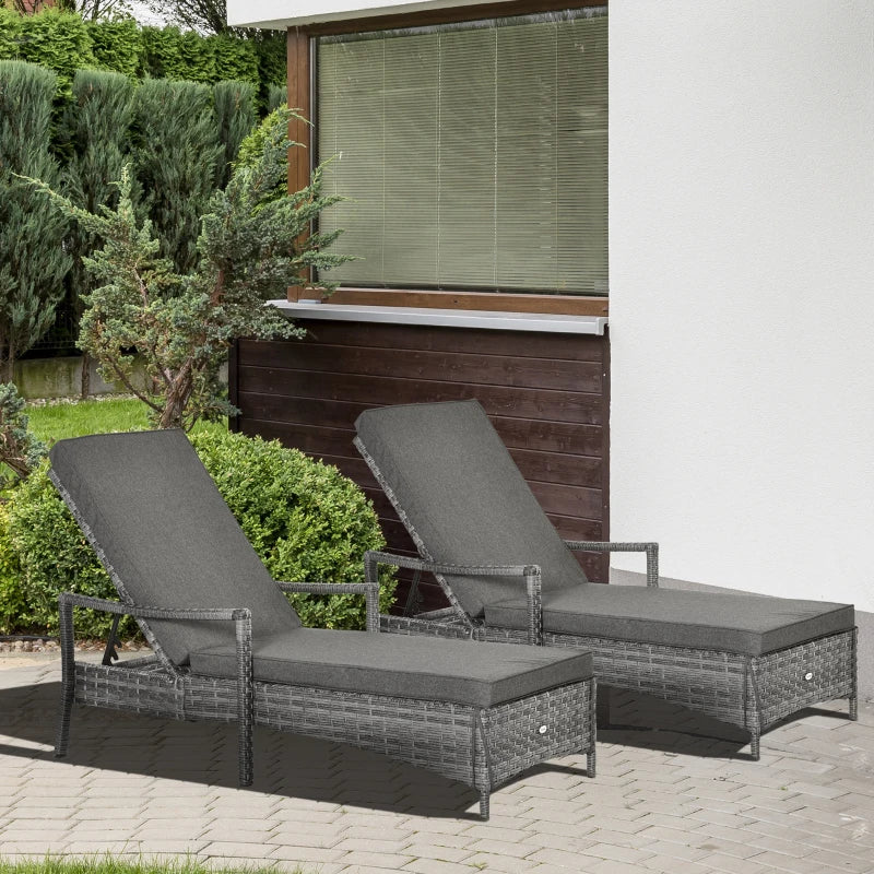 Image of a set of rattan sun loungers with cushions, wheels, and arms - Grey 
