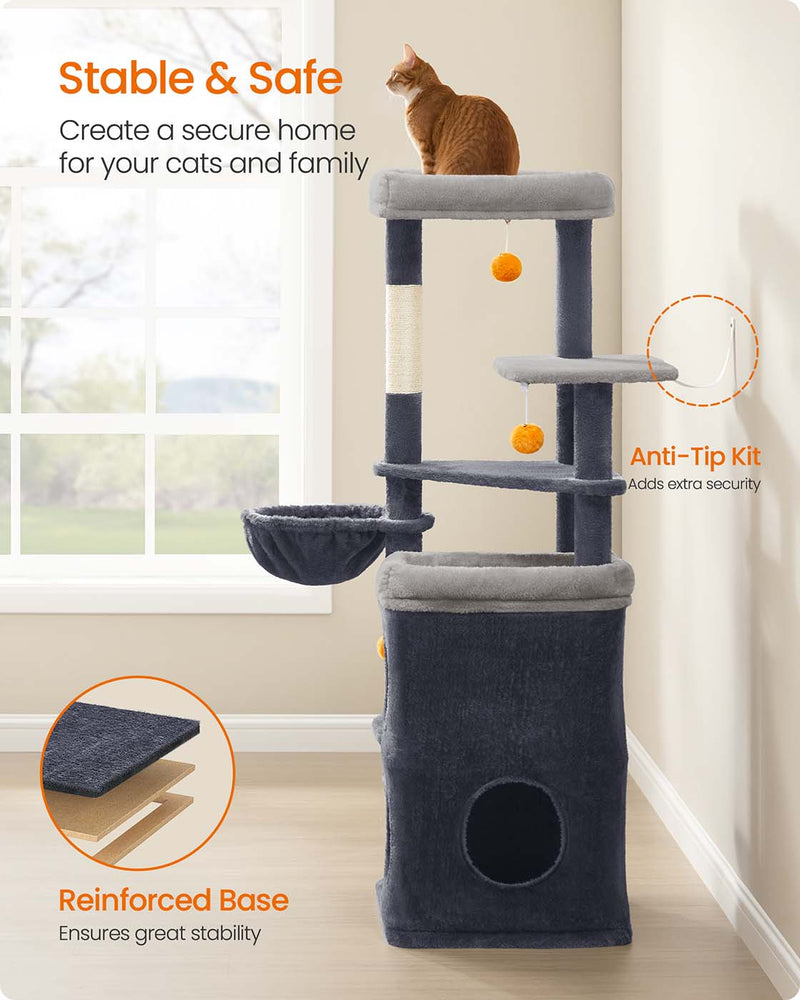 Cat climbing the dark grey cat tree