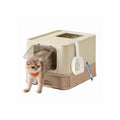Feandrea sand beige and camel brown top entry cat litter box with a cat inside
