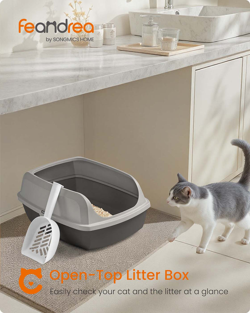Open-top litter box shown in a bathroom setting with a cat approaching