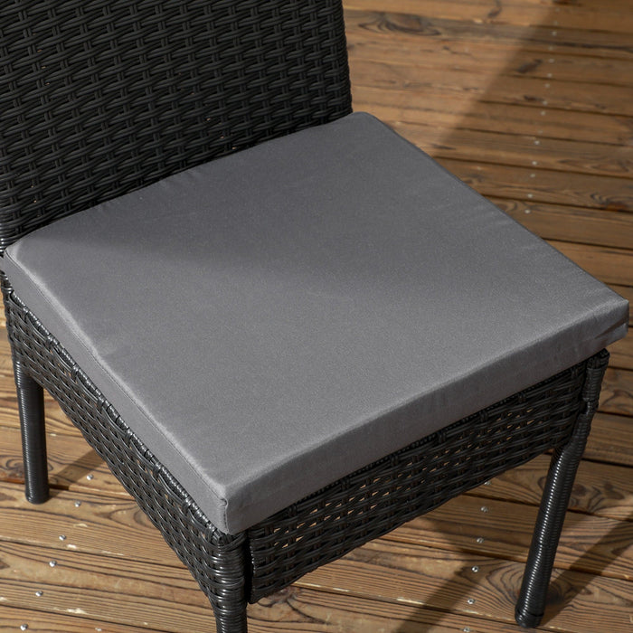 Pair of Black Rattan Garden Dining Chairs With Dark Grey Cushions