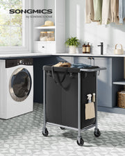 140L Black Laundry Basket with Wheels and 2 Compartments for Sorting Clothes by Songmics