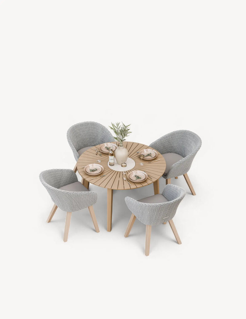 Roma round terrazzo dining table with four Sol chairs