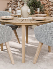 Roma terrazzo dining set on a patio with Sol rope chairs