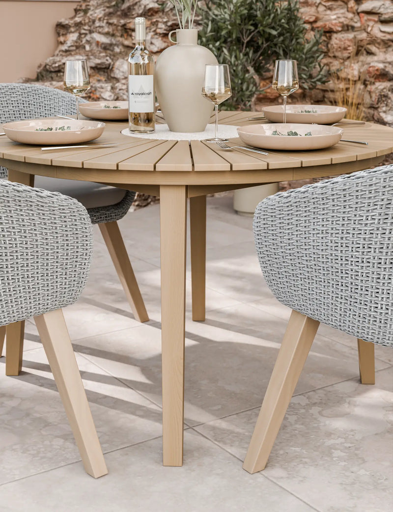 Roma terrazzo dining set on a patio with Sol rope chairs