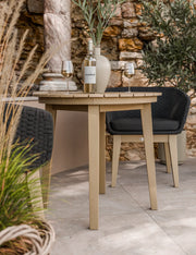 Roma bistro set with black Eden Night chairs in a garden