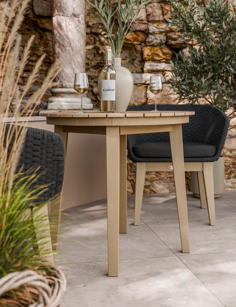 Roma bistro set with black Eden Night chairs in a garden