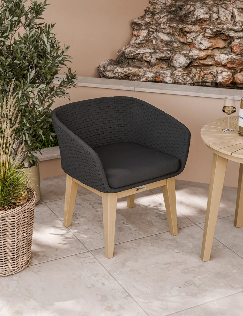 Eden Night black rope chair beside the Roma bistro table