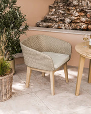 Eden Dawn sand rope chair beside the Roma bistro table