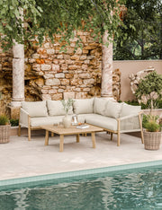 Corner of the Roma acacia wood garden sofa showing rope weave and cushions