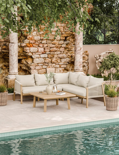 Corner of the Roma acacia wood garden sofa showing rope weave and cushions