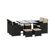 Image of a Black Rattan Cube Patio Furniture Set With Cream Cushions