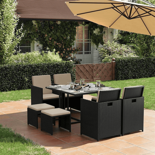 Image of a Black Rattan Cube Patio Furniture Set With Cream Cushions