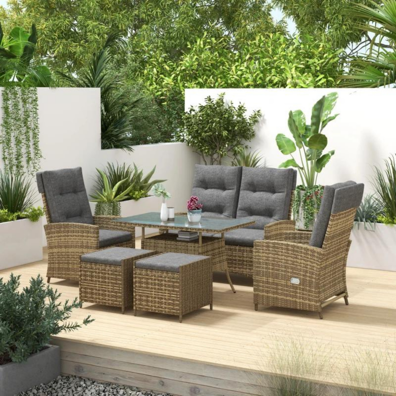 Outsunny rattan patio dining set with reclining arm chairs, footstools and grey cushions - perfect for relaxing in your garden and entertaining.