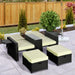 Image of a Black Rattan Reclining Garden Chairs Set With Beige Cushions, Footstools and Centre Table
