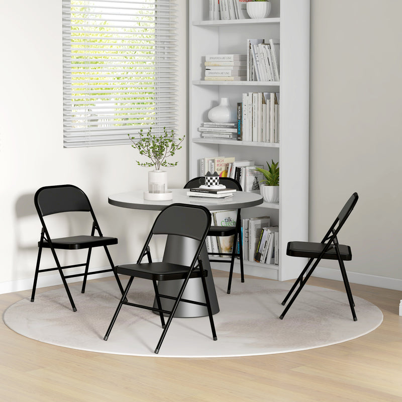 Set of Four Black Folding Chairs with Cushioned Seats and Sturdy Steel Frame