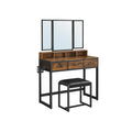 Rustic brown dressing table with tri-fold mirror, storage drawers and padded stool, featuring a black metal frame.