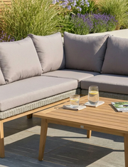 Sol acacia wood corner garden sofa from another angle with coffee table