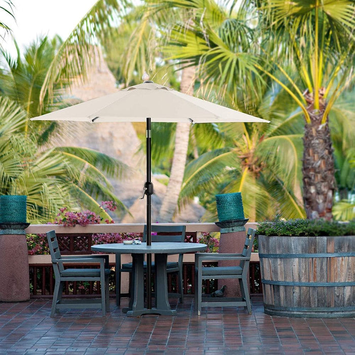 Image of a beige  garden parasol with a crank handle