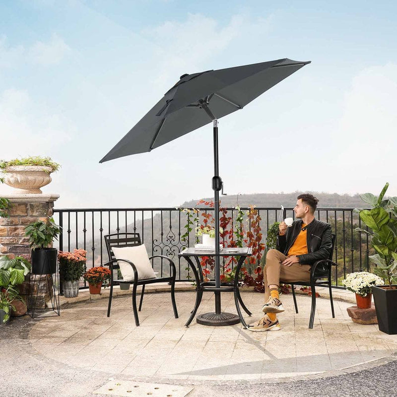 Image of a grey garden parasol with a crank handle