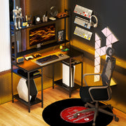 Black Computer Desk with LED Lights and Power Outlets Home Office Gaming Desk by HOMCOM