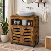Close-up of louvred door slats on bathroom cabinet