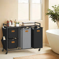 4 Compartment Laundry Sorter with Wheels and Storage Shelves in Chestnut Brown by Vasagle
