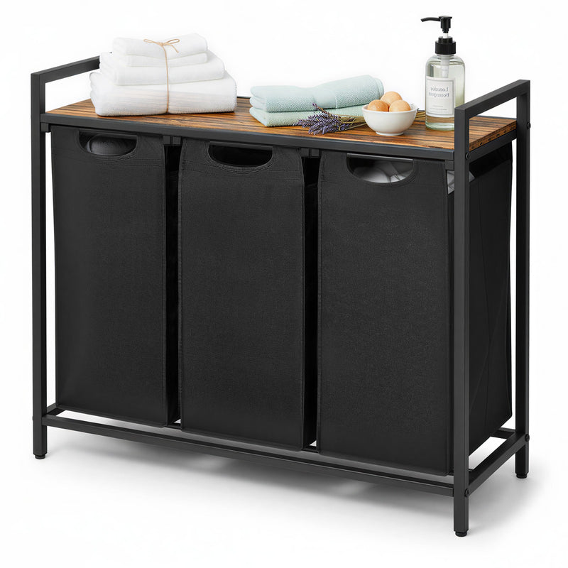 Black laundry sorter with wooden top holding folded clothes and a soap bottle.