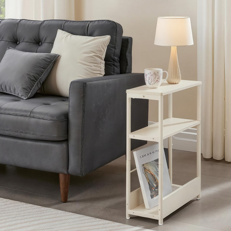 Side table used as a bedside table with charging cables tidied