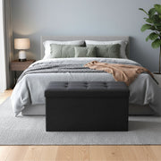 Songmics ottoman used as a footstool in a living room