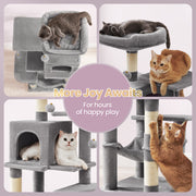 Hanging pompom balls with bells on the cat tree