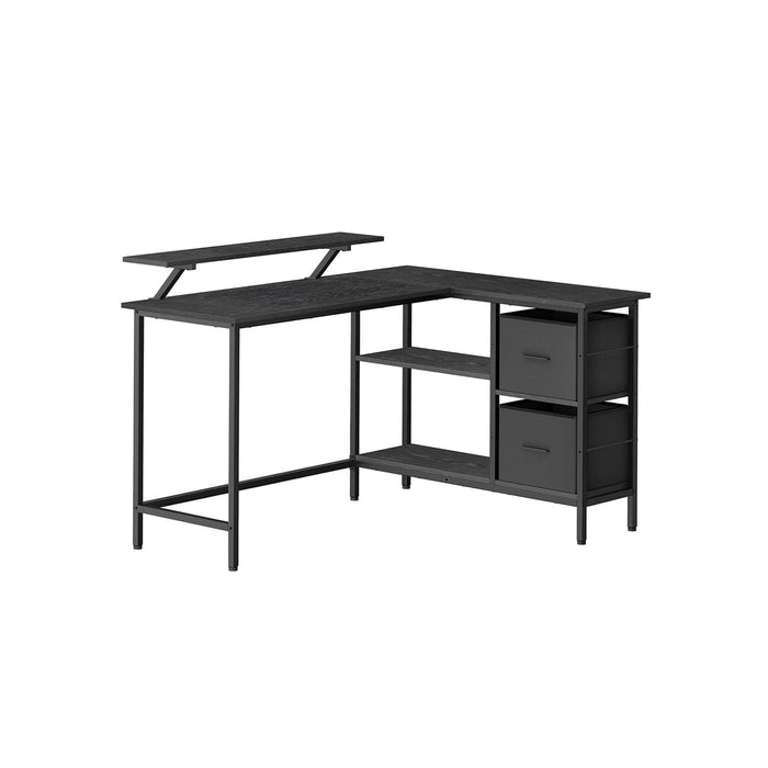 Image of an L shaped office desk with drawers, shelves, and a monitor riser finished in trendy ebony black.