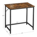 Image of a small desk for small spaces with a rustic brown tabletop and a black frame and legs. 