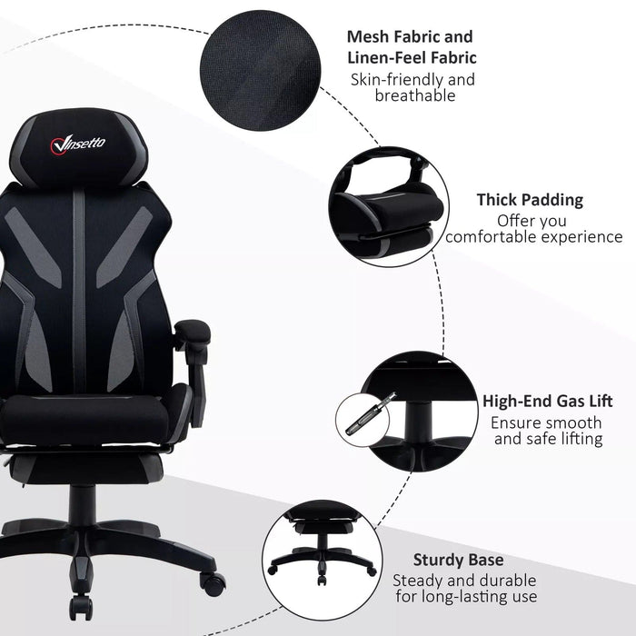 Image of an Ergonomic Vinsetto Mesh Back Reclining Desk Chair With Wheels, Extending Foot Rest, and Adjustable Height Features For Home Office. The Chair is black with grey elements.