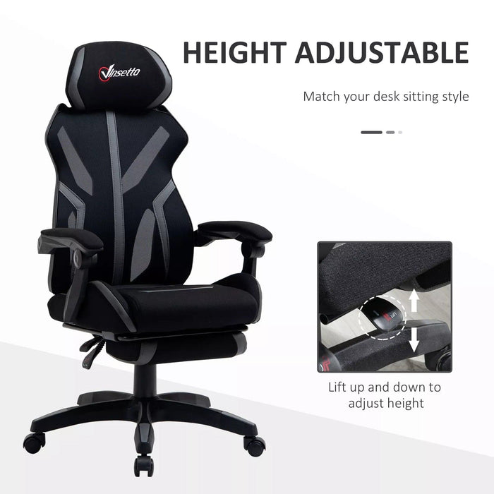 Image of an Ergonomic Vinsetto Mesh Back Reclining Desk Chair With Wheels, Extending Foot Rest, and Adjustable Height Features For Home Office. The Chair is black with grey elements.