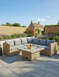 Royalcraft Wentworth 6 seater rattan corner lounging set with grey cushions and an adjustable glass table