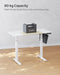 Image of a Songmics White Electric Height Adjustable Desk For Home Office