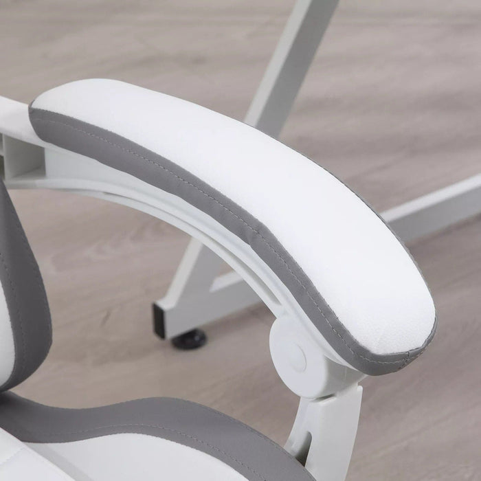 Image of a White Leather Gaming Chair by Vinsetto. The chair has swivel wheels, lumbar support and a neck pillow, a retractable leg rest, padded arms, height adjustment, tilt and a reclining backrest.