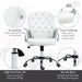 Image of a Vinsetto white leather desk chair with diamante button tufted back rest and a silver frame. The chair has adjustable features like height adjustment, reclining backrest and swivel wheels. This office chair will add a touch of glam and luxury to your home or office.