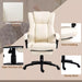 Image of a white office chair with foot rest and swivel wheels