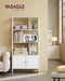 Image of a White Shelving Unit With Cupboard by Vasagle Furniture. White steel frame with white wooden shelves in a staggered arrangement. The cupboards at the bottom have two white doors with dark coloured knobs,