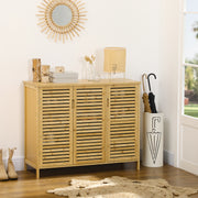 Wooden storage cabinet cabinet with decorative items in a room with a window and rug.