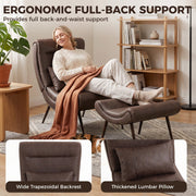 Woman relaxing in the chair with a throw blanket, showing the wide trapezoidal backrest and lumbar pillow