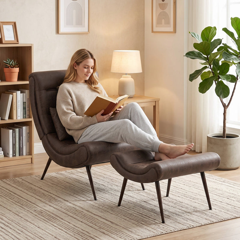 Woman reading in the accent chair beside a bookshelf and lamp
