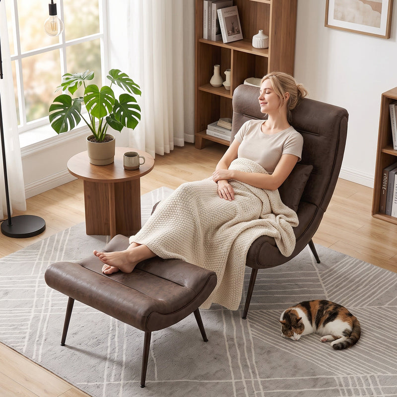 Woman relaxing wrapped in a blanket with feet up on the footstool, cat resting nearby
